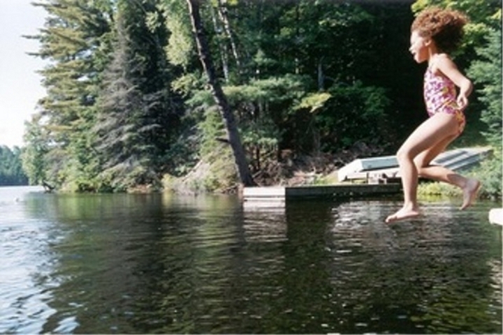Jumping off the dock.